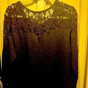 This sweater is worn but well cared for.